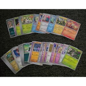 Lot of 50 Pokemon Cards from Surging Sparks and Paradox Rift